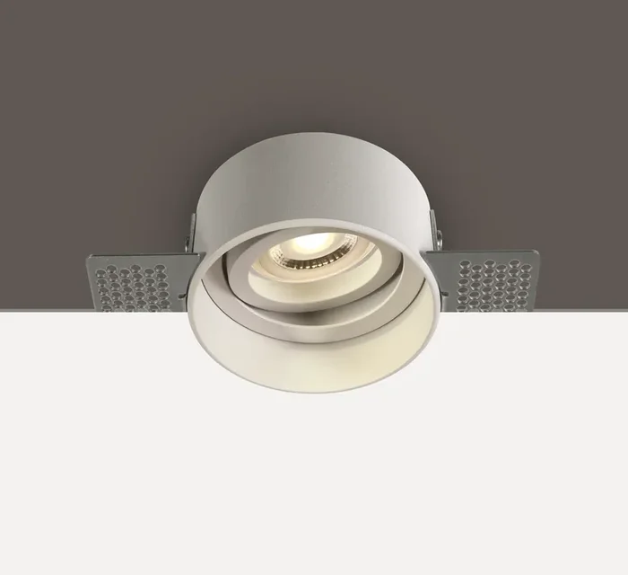 White Recessed Trimless adjustable mains spot with GU10 lamp holder.